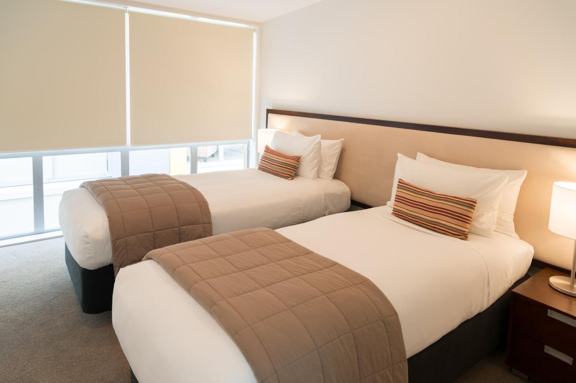 Boulcott Suites Веллингтон Экстерьер фото A typical bedroom at the hotel